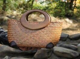 Foto van Tassen 29x21cm thailand straw bag handwoven women handbag rattan woven pouch original wooden handle 