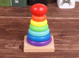 Foto van Speelgoed wooden toys for children educational seven color tower rainbow stacks of building blocks