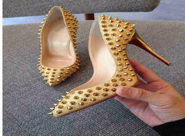 Foto van Schoenen new luxury women shoes high heel rivets pumps red bottom pointed toe studded full spikes la