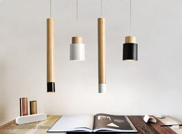 Foto van Lampen verlichting modern creative wood pendant lights nordic simple bedroom bedside straight black 