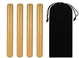Foto van Sport en spel 2 pairs classical solid hardwood claves percussion instrument 8 inch rhythm sticks wit