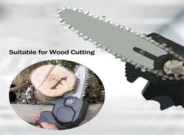 Foto van Gereedschap cordless electric chain saw household small handheld wireless lithium battery outdoor lo