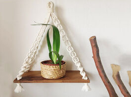 Foto van Huis inrichting wall storage shelf woven cotton swing rope wooden plate living room bedroom bathroom