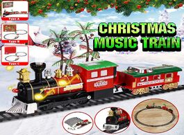 Foto van Speelgoed christmas electric train toys long rail track set with light sound classic steam diy stitc