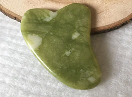 Foto van Schoonheid gezondheid jade scraping board face massage relaxation massager stone scraper gouache ant