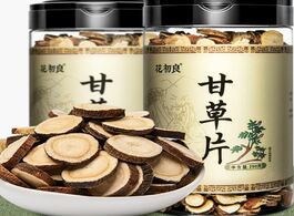 Foto van Meubels licorice tablets soaked in water bottled hay powder tea traditional chinese medicine astraga