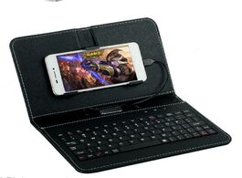Foto van Telefoon accessoires hot sale tablet case cover keyboard general wired flip holster for andriod mobi