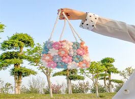 Foto van Tassen hand woven woolen crochet bag with puff flowers women 2020 new creative chrysanthemum messeng