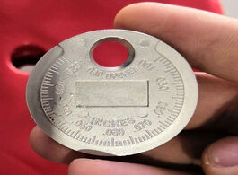 Foto van Gereedschap plug gap gauge tool measuring currency type gage meter
