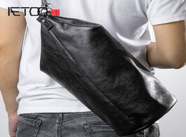 Foto van Tassen aetoo personality one shoulder slanted bag head leather cylinder fashion trend men s