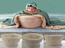 Foto van Baby peuter benodigdheden a newborn photography prop beige soft and comfortable sitting basket assis