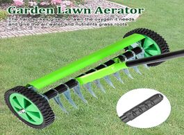 Foto van Gereedschap 5.7 inch heavy duty rolling grass lawn garden aerator roller yard cultivator scarificati