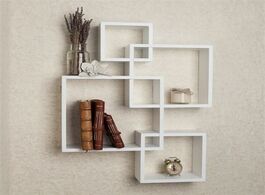 Foto van Huis inrichting set of 4 square shape intersecting decorative color wall hanging shelf rack bedroom 