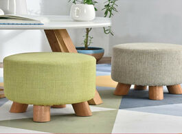 Foto van Meubels living room luxury upholstered footstool nordic round pouffe stool wooden leg pattern fabric
