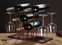 Foto van Huis inrichting iron wire forest leaf wine rack stand hanging drinking glasses stemware shelf bottle