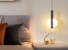 Foto van Lampen verlichting ring pendant modern minimalist creative personality bedroom bedside long linepend