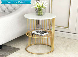 Foto van Meubels nordic simple golden iron coffee table with marble tabletop living room minimalist bed small