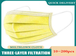 Foto van Beveiliging en bescherming yellow disposable non woven 3 layer protective mask breathable mouth with