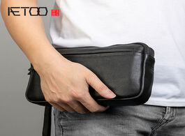 Foto van Tassen aetoo hand bag male leather handbag wristband grasp trend casual men s