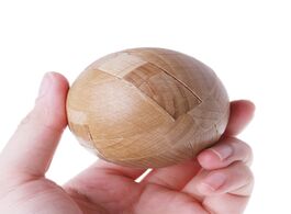 Foto van Speelgoed wooden puzzle magic ball intelligence game brain teasers toy adults kids games and puzzles