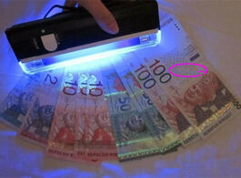Foto van Beveiliging en bescherming 10pcs money detector with torch portable uv ultra violet led light lamp i