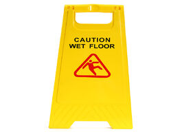 Foto van Auto motor accessoires caution wet floor yellow plastic a type folding safety sign slippery both sid