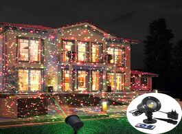 Foto van Lampen verlichting moving full sky star laser projector landscape lighting red green christmas party