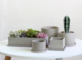Foto van Huis inrichting cement flowerpot silicone mold cylindrical square geometry concrete gardensucculent 