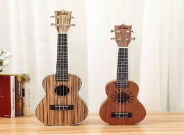 Foto van Sport en spel 21 23 inches 4 strings soprano ukulele tenor acoustic guitar with mixer paddle spare s