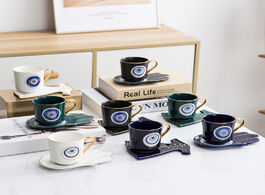 Foto van Huis inrichting turkish blue eyes luxury coffee cup saucer set with hand and clothe shape dish ottom