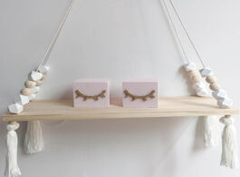 Foto van Huis inrichting nursery creative kids room wooden beads tassel wall shelf storage organization swing
