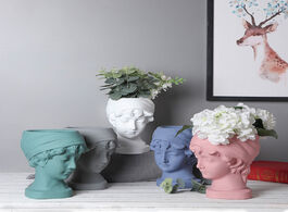 Foto van Huis inrichting portrait of a cement flowerpot silicone mold art sculptures decorate nordic home des