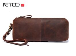Foto van Tassen aetoo new style leather bag retro crazy horse clutch handbags men s ladies