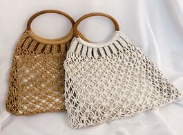 Foto van Tassen fashionable bohemian women handbag straw bag hollow rattan rope beach