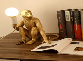 Foto van Lampen verlichting seletti resin black monkey lamp dining room bar kitchen restaurant animal white g