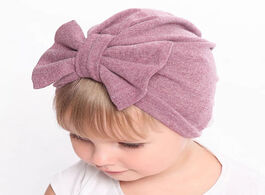 Foto van Baby peuter benodigdheden fashion autumn winter warm hat big bow elastic headbands cotton beanie cap