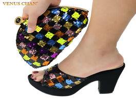 Foto van Schoenen latest african matching shoes and bag in black color high quality italian with shinning cry