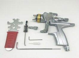 Foto van Auto motor accessoires steel nozzle paint spray gun professional airbrush for cars painting
