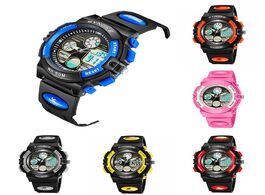 Foto van Horloge waterproof digital analog dual time date alarm luminous kid boy girl wrist watch