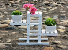 Foto van Meubels white wooden plant flower pot shelf stand holder garden balcony display rack wrought multi l