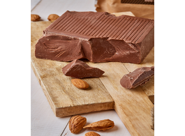 Foto van Food chocolate milk on almond raw organic natural lactose free sugar tile 500 grams